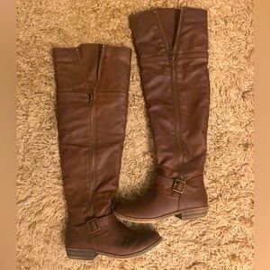 Thigh high boot, brown with rust undertones, brushed gold buckle, 1/2 inch heel.
